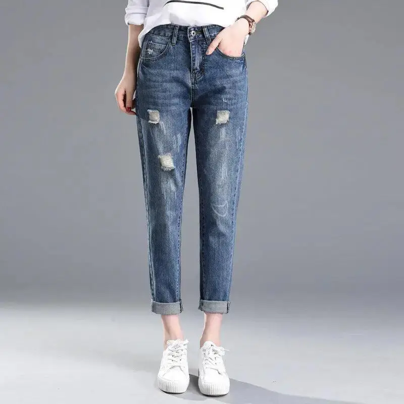 Ripped denim jeans for women