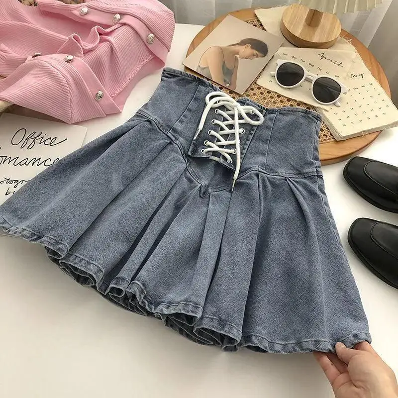 Small Students Show Thin Denim Skirt In Summer
